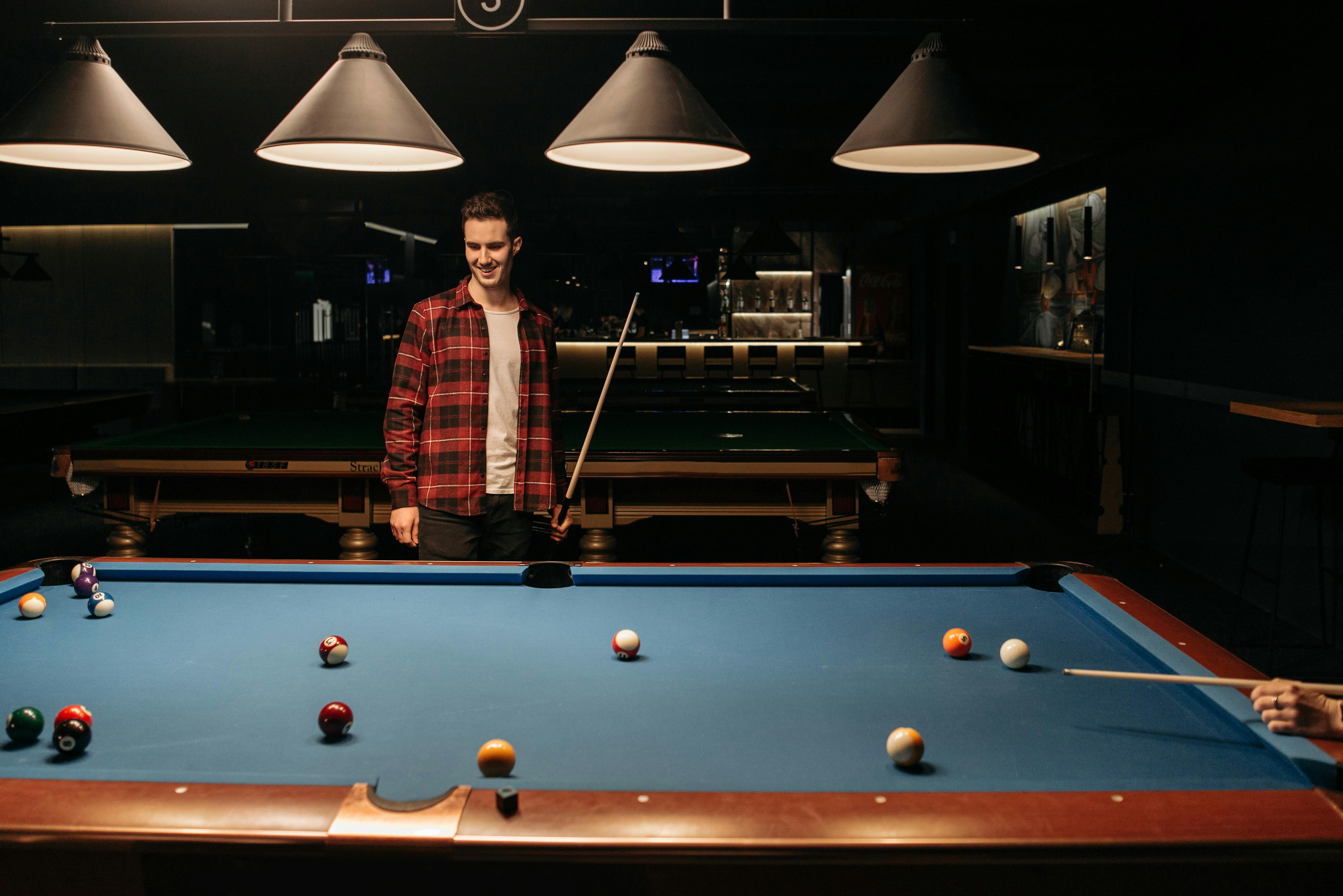 Player setting up pool balls
